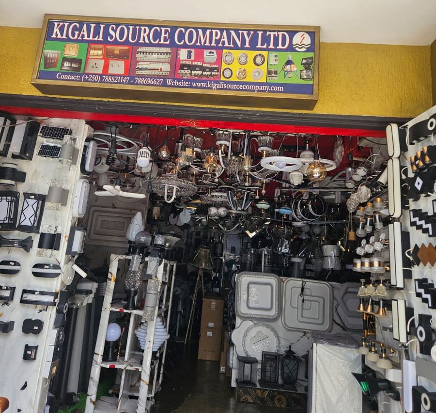 Front of Kigali Source Company Ltd with its blue sign and lights on display