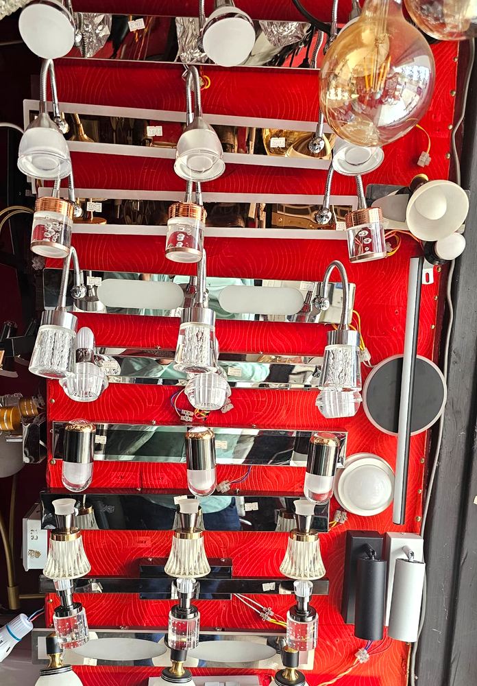 Wall of mirror and vanity lights